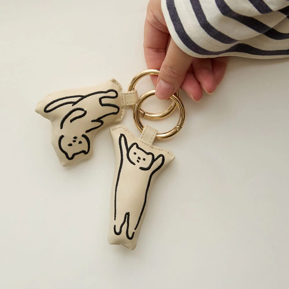 N+ECOLOGY ネコロジーの猫イラストのキーホルダー